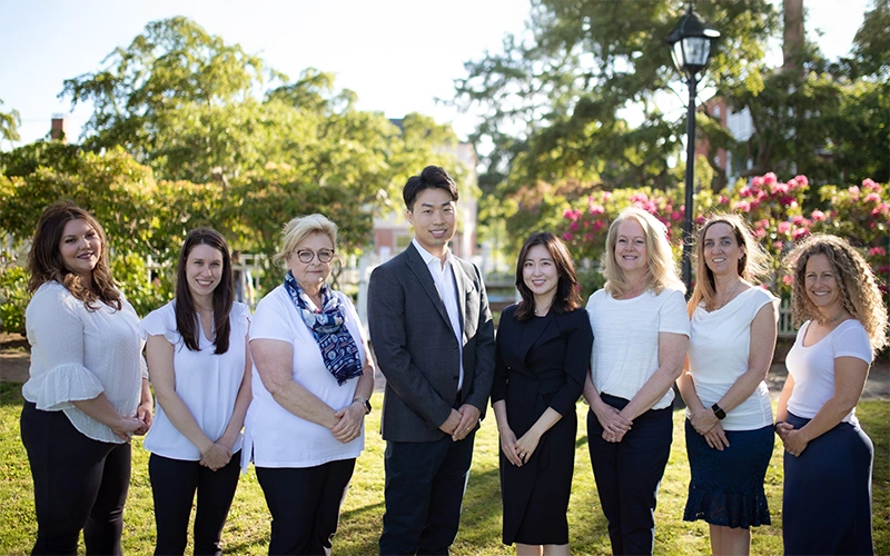 Dentist Henry Hur With Team Outdoors